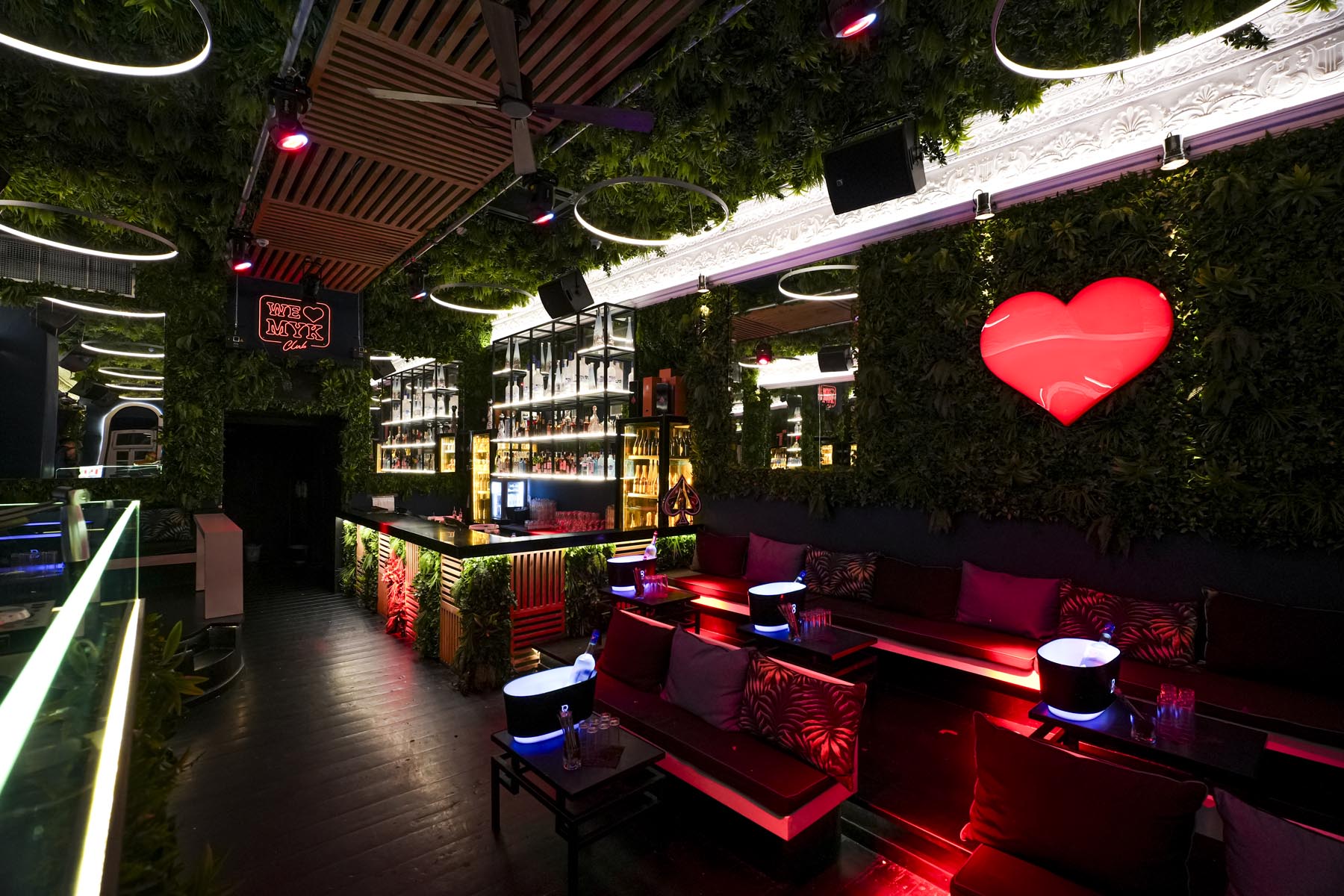 "Vibrant nightlife crowd at We Love Mykonos open-air club, Mykonos Town"