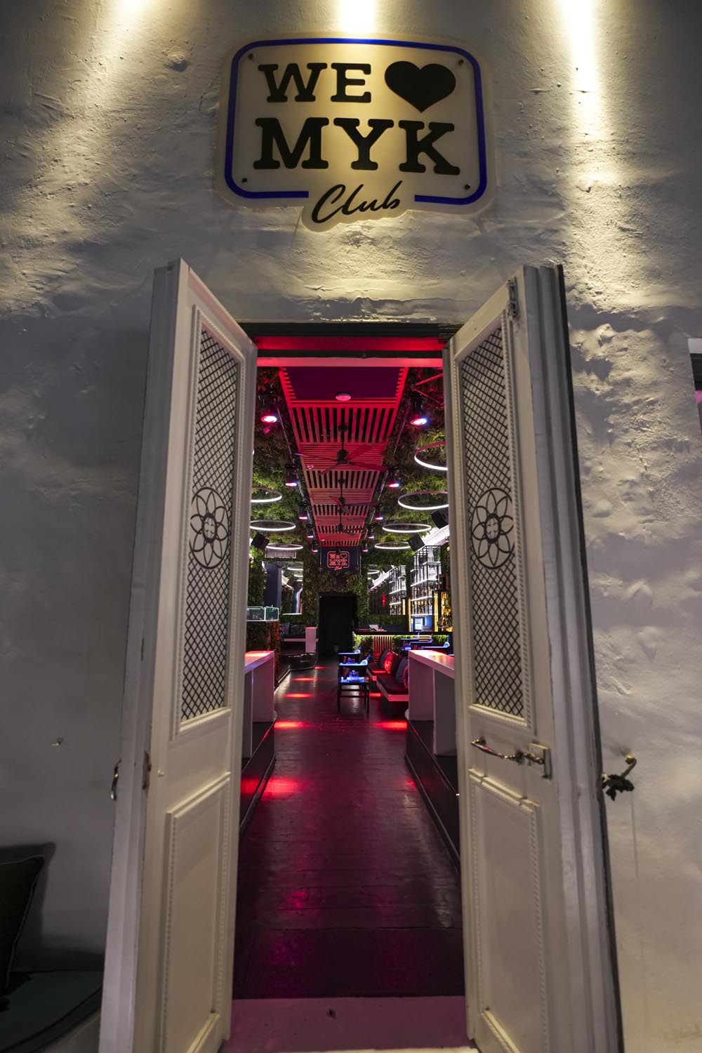 "Vibrant nightlife crowd at We Love Mykonos open-air club, Mykonos Town"