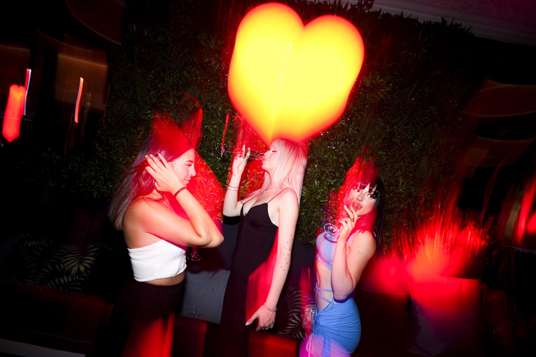 "Vibrant nightlife crowd at We Love Mykonos open-air club, Mykonos Town"
