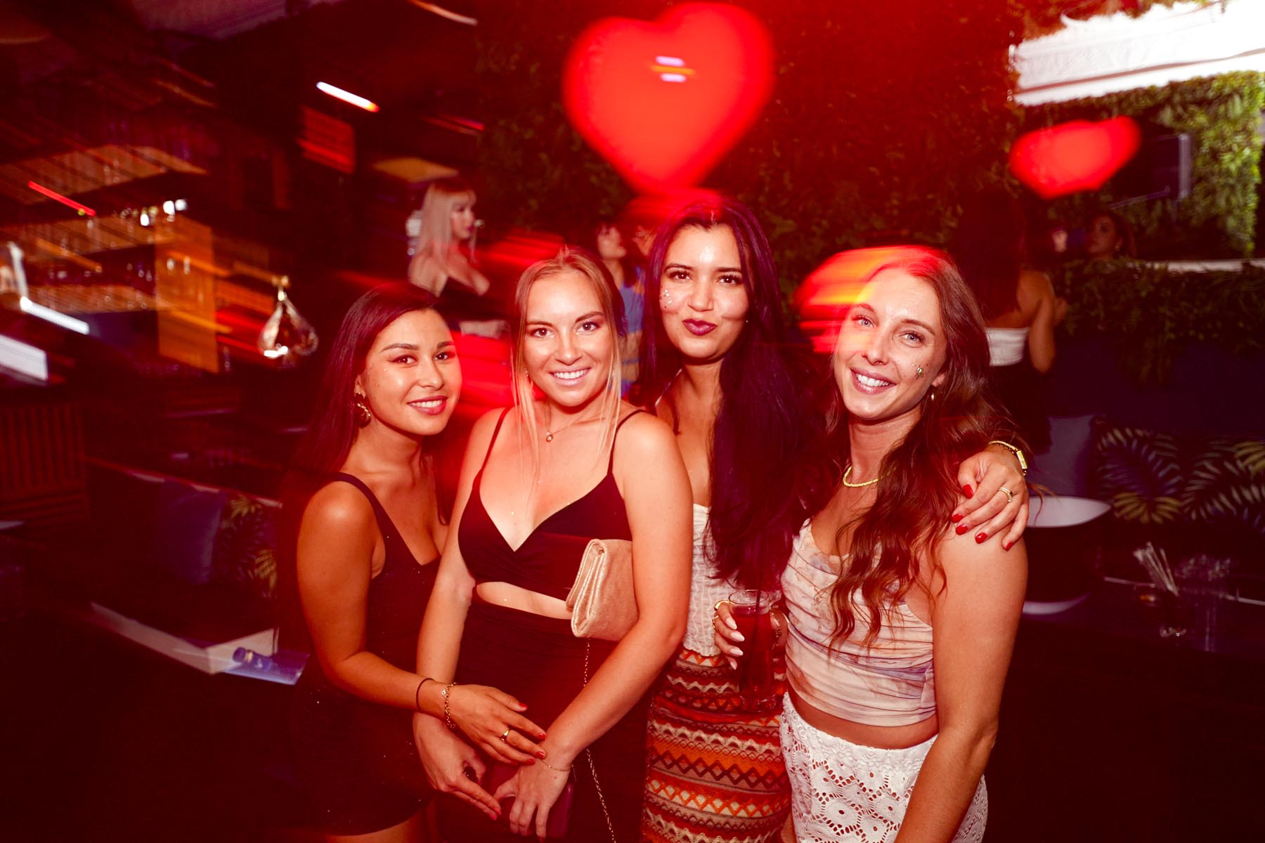 "Vibrant nightlife crowd at We Love Mykonos open-air club, Mykonos Town"