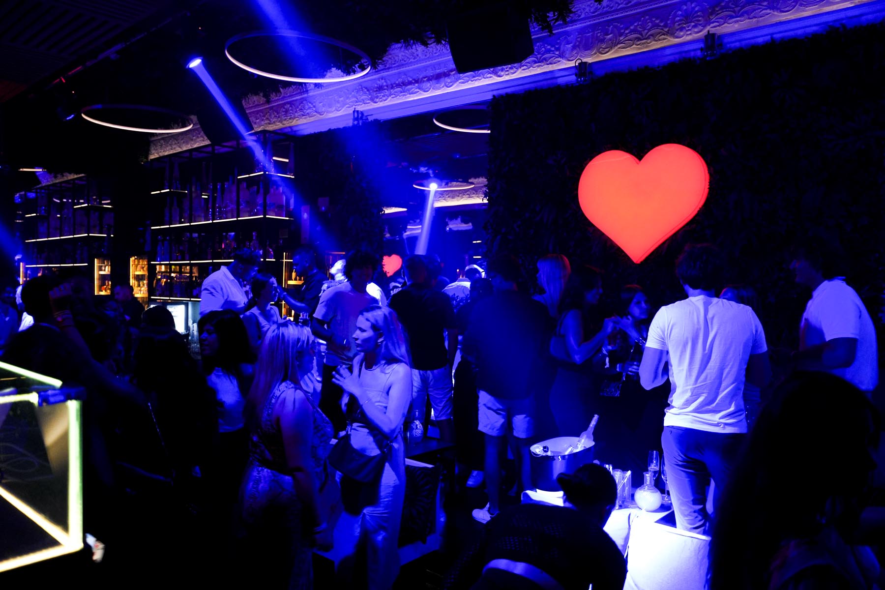 "Vibrant nightlife crowd at We Love Mykonos open-air club, Mykonos Town"