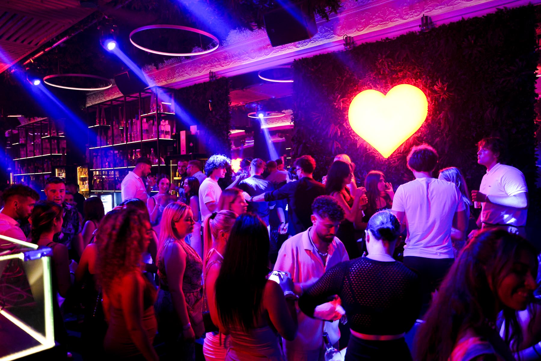 "Vibrant nightlife crowd at We Love Mykonos open-air club, Mykonos Town"