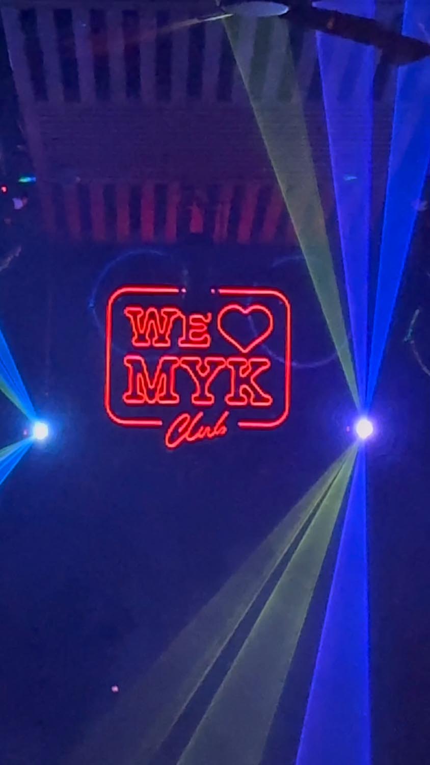"Vibrant nightlife crowd at We Love Mykonos open-air club, Mykonos Town"